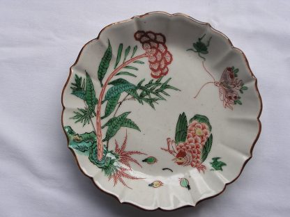 Plate with chicken and butterfly, 1690-1730